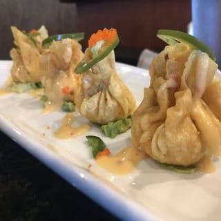 O Spicy Lobster Dumpling **